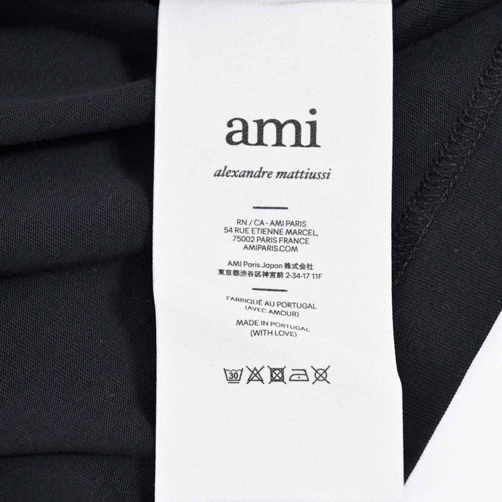 アミ AMI クルーネック長袖Ｔシャツ BFUTS235.724 001 ブラック 2025SS メンズ